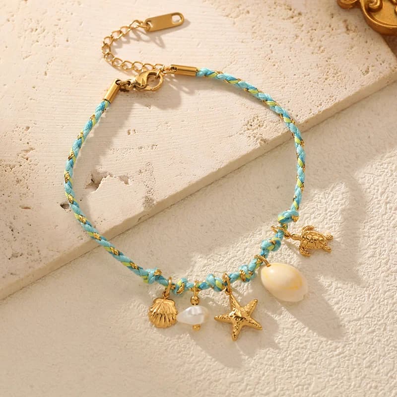 Vòng Tay Đính Sao Biển Và Vỏ Sên Trên Dây Cột